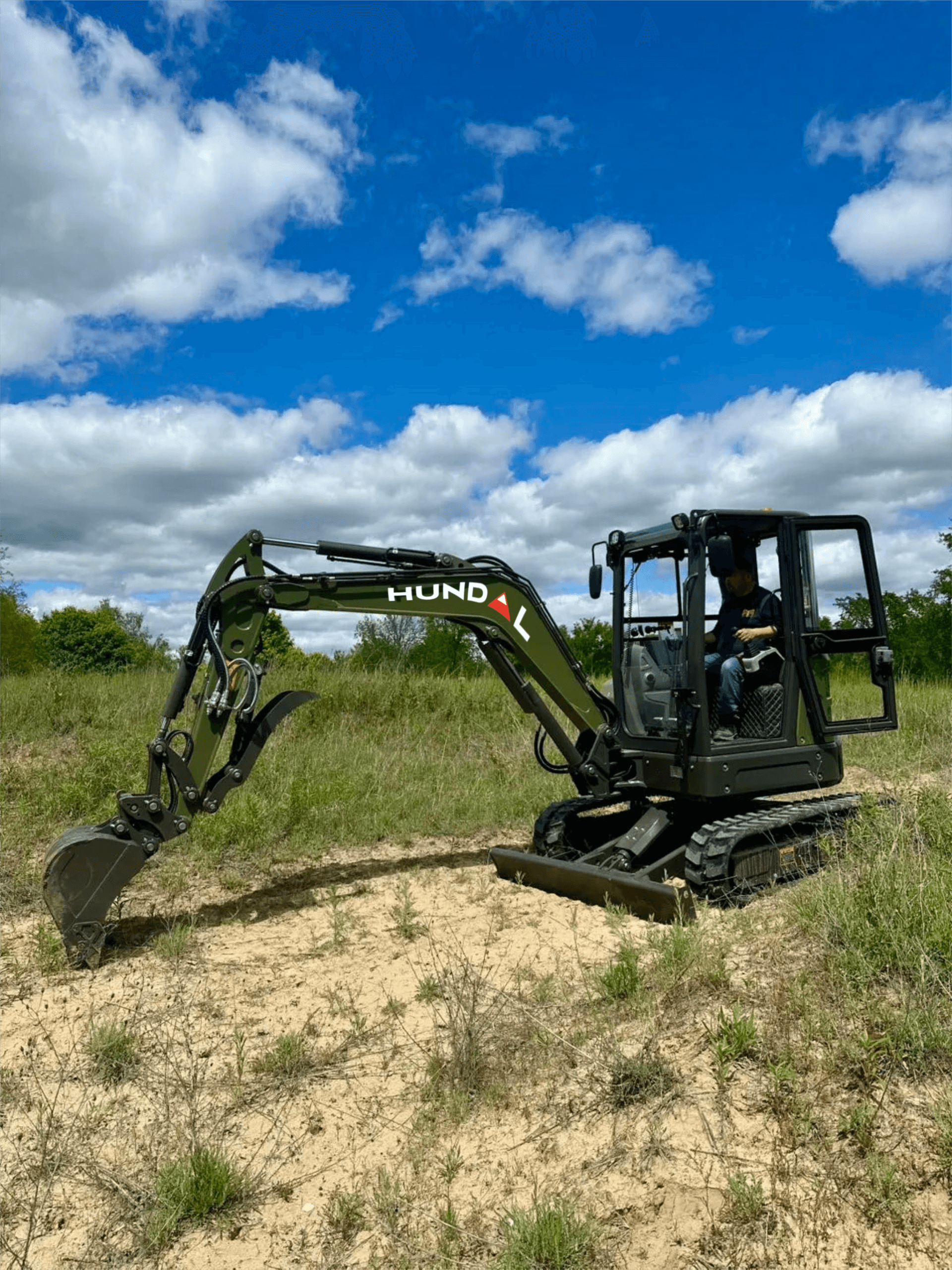 Hundal Heavy Industries equipment on a farm site